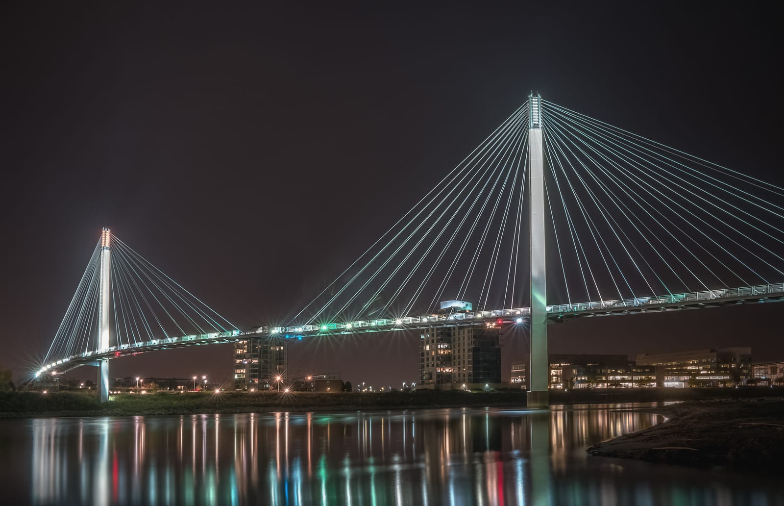 Bob Kerrey Pedestrian Bridge at night connecting Omaha to Council Bluffs